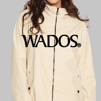 Beige WADOS raincoat with front zipper and side pockets, styled for casual wear.