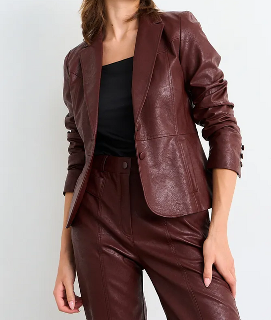 Blazer IO Blazer Io Liso en color cafe moro.