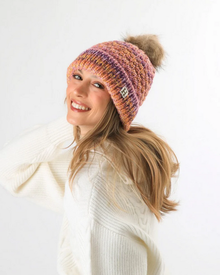 Gorro Humana HUMANA en color purple.