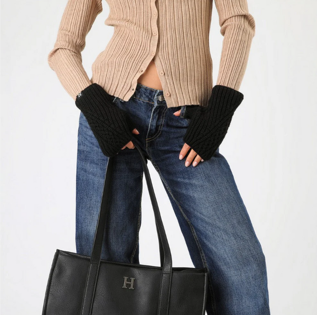 Guante Humana HUMANA en color negro.