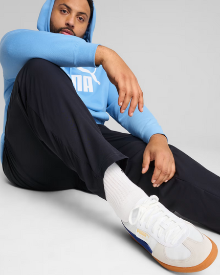 PANTALON DE BUZO PUMA ESS LOGO WOVEN OP