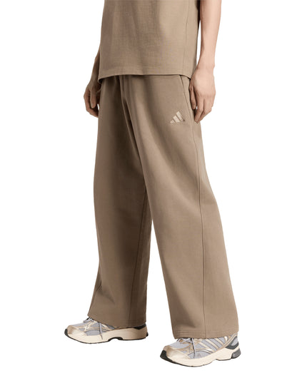 Pantalón de buzo Adidas AK SL WD PT en color khaki