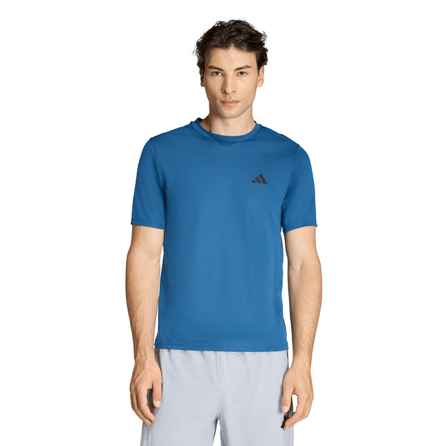 Polera Adidas We Bas T en color petróleo.