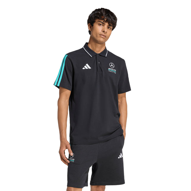 Polera Adidas Mer Dna Polo en color negro.
