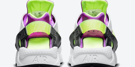 Nike Air Huarache sneakers in neon green and purple, rear view showing AIR cushioning